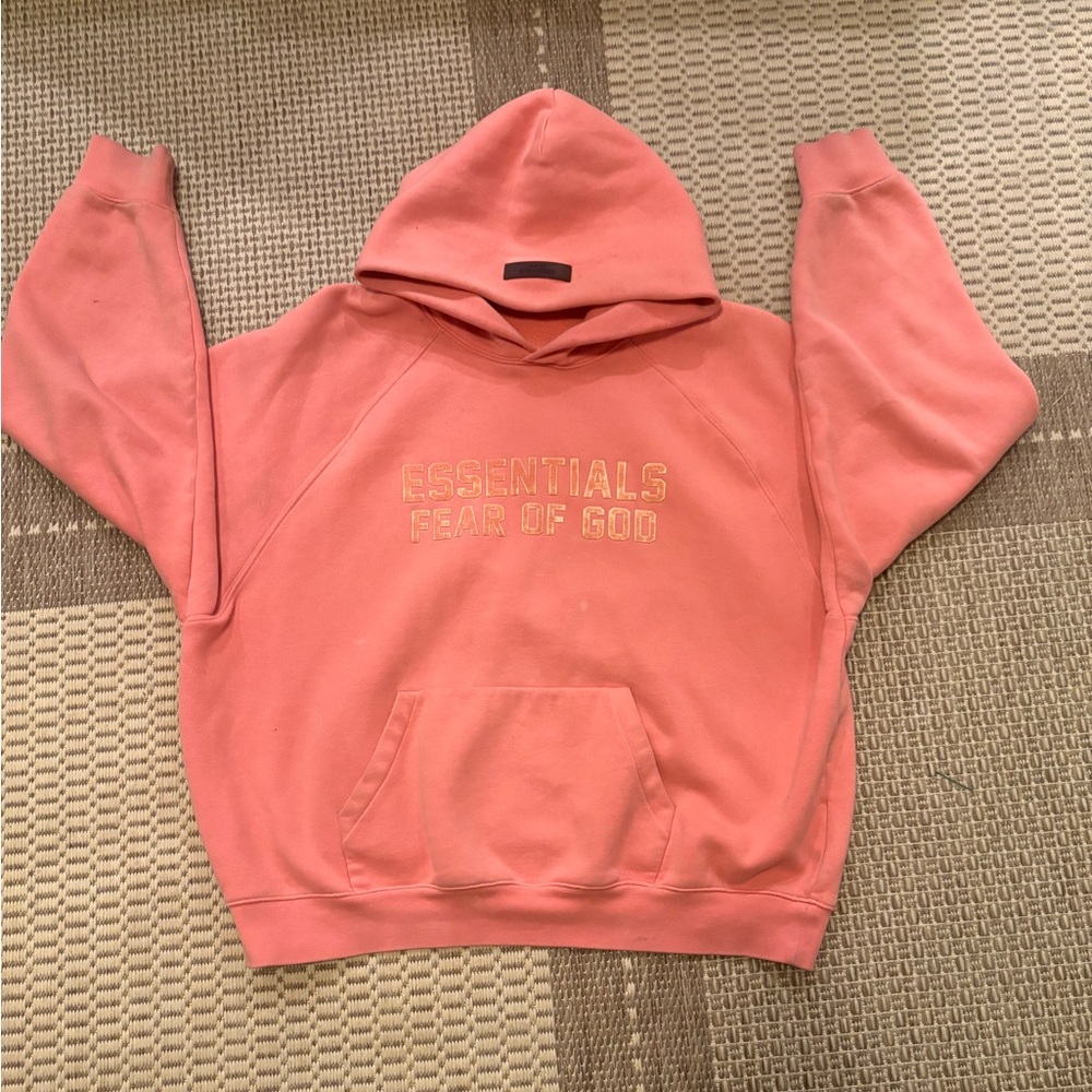 Fear of God Essentials Hoodie in Coral
